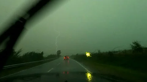 Lightning strike during heavy rain in the center of a hurricane Stock Footage 158142517