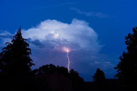 Lightning strike in the dusk Stock Photos