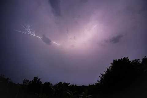Lightning strike at night Stock Photos