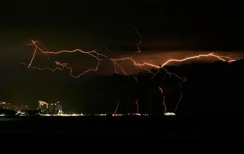 Lightning strike on night sky Фото