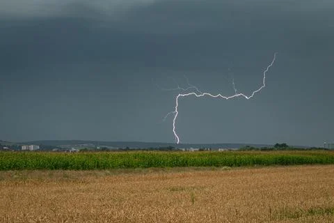 Lightning strike over the fields Foto stock