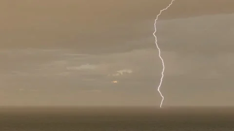 Lightning strike over ocean Video stock 220186565