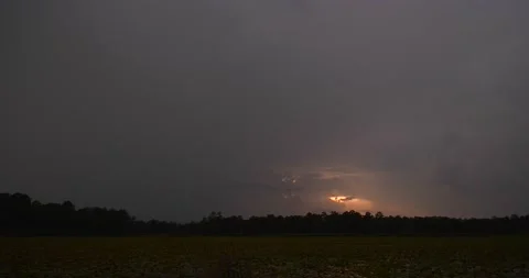 Lightning strikes 4x in quick succession over dark, ominous sunset Stock Footage 137467859