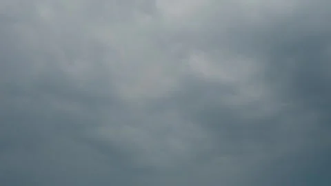 Lightning strikes illuminate dark storm clouds in dramatic weather display Stock Footage 318821160