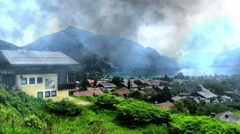 Lightning strikes light up clouds over country village Stock Footage 62905363