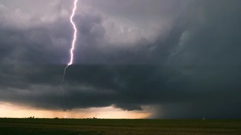 Lightning Strikes Nearby Farm During Storm Stock Footage