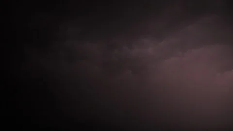 Lightning strikes through dark stormy sky Stock Footage 97234575