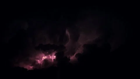 Lightning strikes, thunder. Big thunderstorm at night with purple clouds. 库存影片 246766832