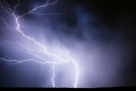 Lightning strikes in a thunderstorm Stock Photos