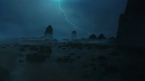 Lightning striking a dark, fog covered beach. Stock Footage 76990822
