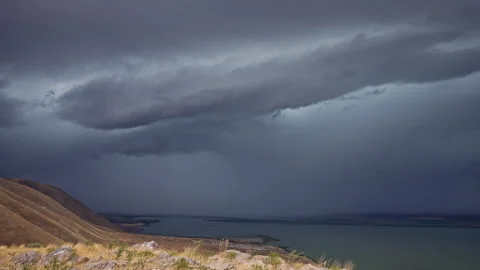Lightning striking the surface of Utah Lake during severe thunderstorm Stock Footage 282393454