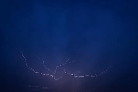 Lightning in a summer thunderstorm Stock Photos