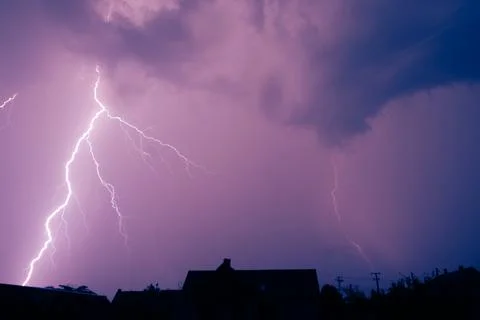Lightning in a summer thunderstorm Stock Photos