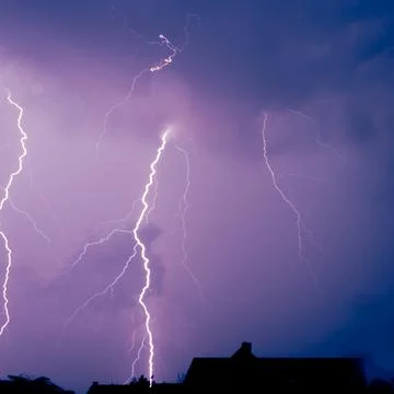 Lightning in a summer thunderstorm Stock Photos