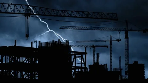 Lightning Thunderstorm Flash over Towers Cranes in Construction Site Stock Footage 153429200