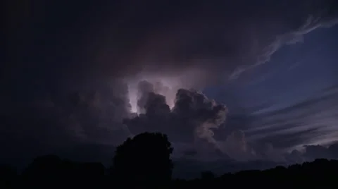 Lightning Time Lapse with Dusk Sunset Colors and Brilliant Flashes Stock Footage 64558298