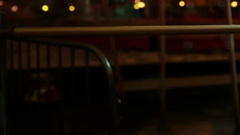 Lights and barriers in a night setting at a local event Stock Footage 345064316