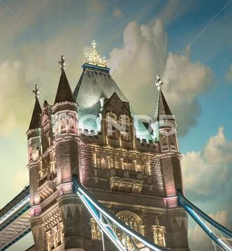 Lights and colors of tower bridge at sunset with clouds - london Stock Photos