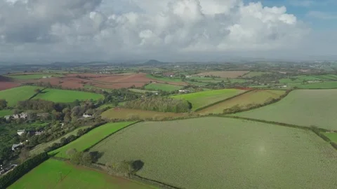 Lights and Shadows over Fields and Farms from a drone, Devon, England, UK Vidéo 254560367