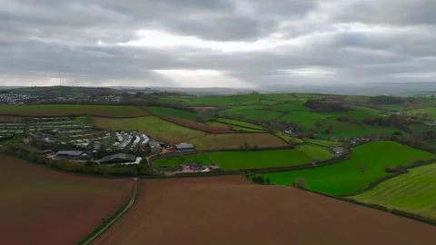 Lights and Shadows over Fields and Farms from a drone, Devon, England, Europe 動画素材 261043459