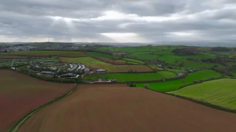 Lights and Shadows over Fields and Farms from a drone, Devon, England, Europe 動画素材 261043517