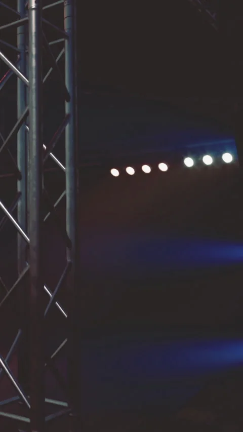 Lights and structure in a performance space during evening setup Stock Footage 332212516