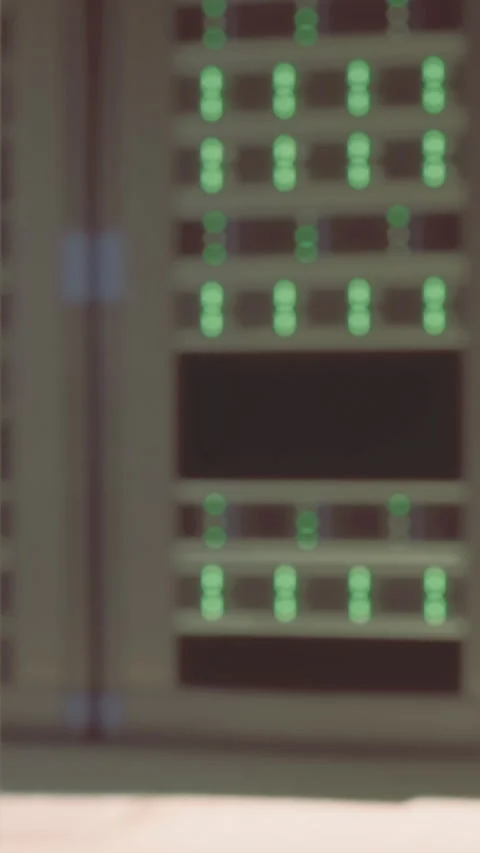 Lights blink on a server rack in a data center during the day Stock Footage 334171335