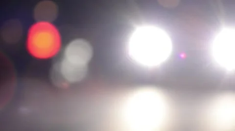 Lights from car headlights walk down the street, their journey at night Vídeos de archivo 60697950