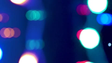 Lights of Christmas tree garland in defocus. Christmas lights. Stock Footage 257426565