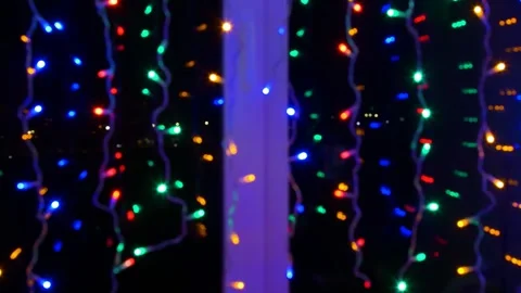 Lights of Christmas tree garland in defocus. Christmas tree lights. Stock Footage 257451186