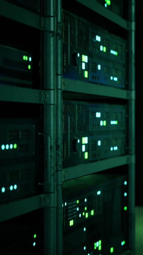 Lights on computer servers in a dark room during a technology event Stockbeeldmateriaal 338389262