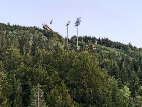 Lights contrast nature, dramatic scene where stadium lighting intersects wi.. Stock Photos