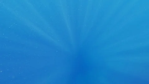 Lights dancing under water surface footage Stock Footage 115264706