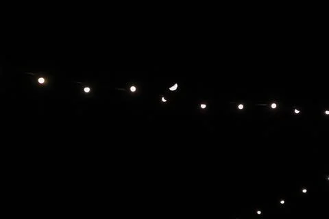 Lights on dark black background Stock Photos