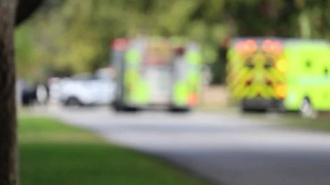 Lights on Emergency Vehicles blurred image at accident scene Stock Footage 102184624
