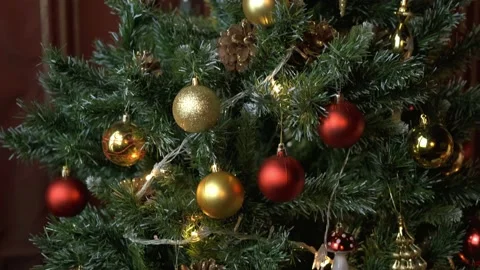 Lights flash on a decorated New Year's tree. Garlands flash. New Year, Christmas Stock Footage 142605436