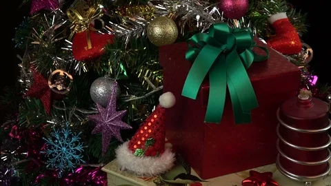 Lights flashing on christmas tree with decorations and christmas gift box Stock Footage 119506579