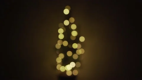 Lights flickering on Christmas tree. Blurred Stock Footage 146473749
