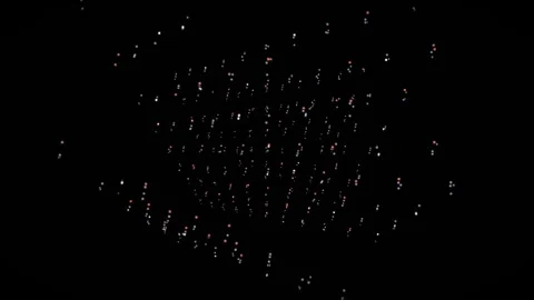 Lights form patterns in a dark space showing movement from Stock Footage 340154184