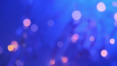 Lights of garlands on a blue background. Soft focus. Stock Footage 302916406