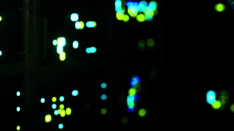 Lights glow in data center during night time work hours Stock Footage 345003553