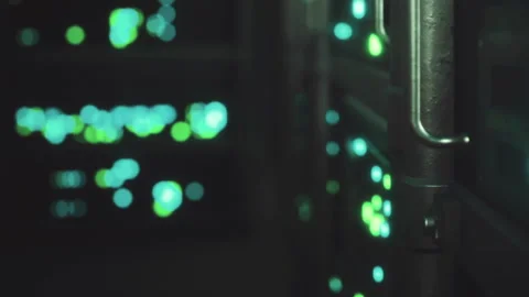 Lights glow on server equipment in a data center during evening hours Stock Footage 345006158