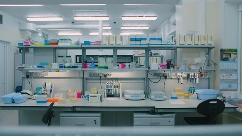 The lights go out in the empty lab at the end of the workday Stock Footage