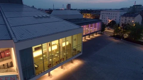 Lights inside a Beautiful Modern Building with Large Windows at Nighttime / Pfal Stock-Footage 120560712
