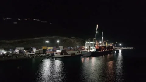 Lights of night Sint Maarten cargo port where container ship loading does not Stock Footage 234029571