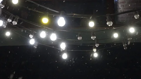 Lights in night in slow motion, snowing Stock Footage 86682891