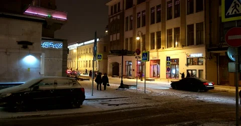 Lights night winter city, intersection, people, cars Stock Footage 67394686