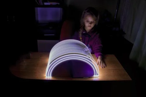 Lights from the opening of the book Stock Photos