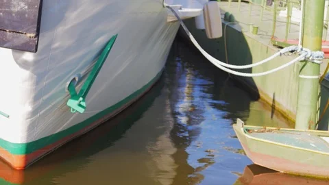 Lights reflected on the side of a ship Stock Footage 88939259