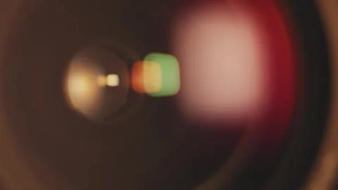 Lights reflecting in the camera lens glass. Stock Footage 284043161